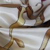 Gold belt & buckle scarf detail