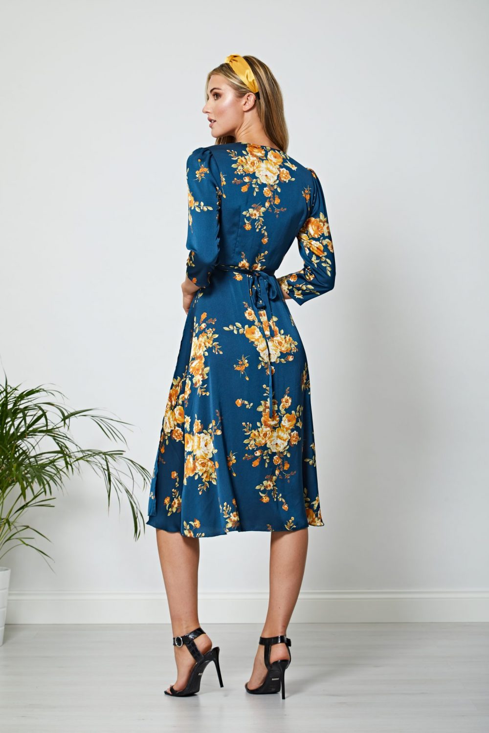 Blue Floral Wrap Dress. A gorgeous blue dress with stunning gold flowers