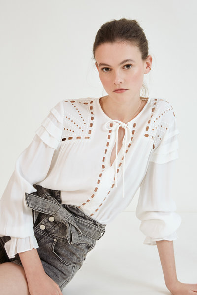 Cream Fluid Blouse is a pretty striking and contemporary look